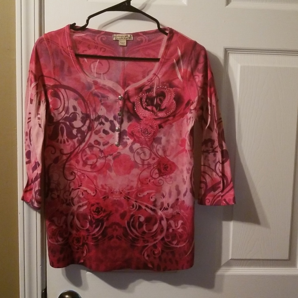 This beautiful long sleeve shirt is light pink